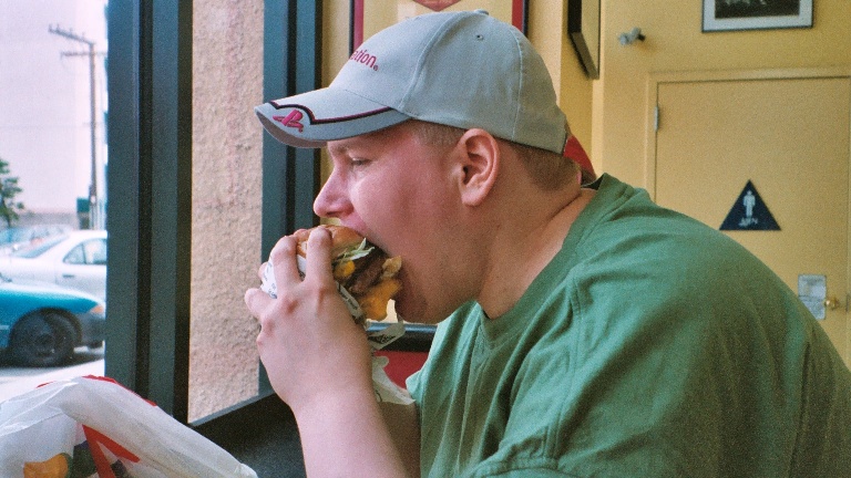 Chowing down at Fatburger in San Diego. Gluttony with a view of hot women. Paradise.