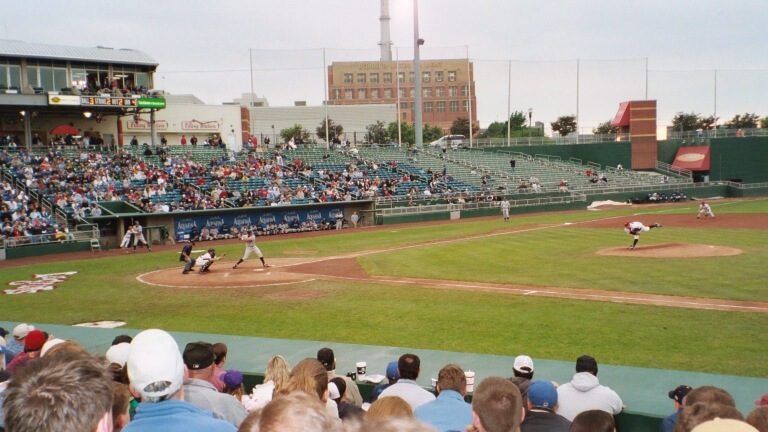 Top of the 4th. 2 outs.  Kelly Hunt strikes out swinging. That white blur in the middle of the image is the ball.