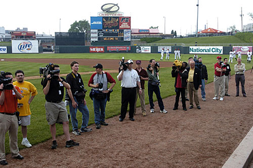 May 20. The media waits in front of the dugout to catch Mark Prior. Usually, there's one or two media folks at a game. The lame thing is they closed down the autograph area both times Prior pitched.  (Photo by Chris Holmes, Lansing State Journal)