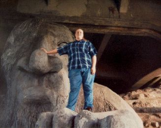 Frank posing atop the Fremont Troll's paw. Taken in Seattle sometime in 1994.